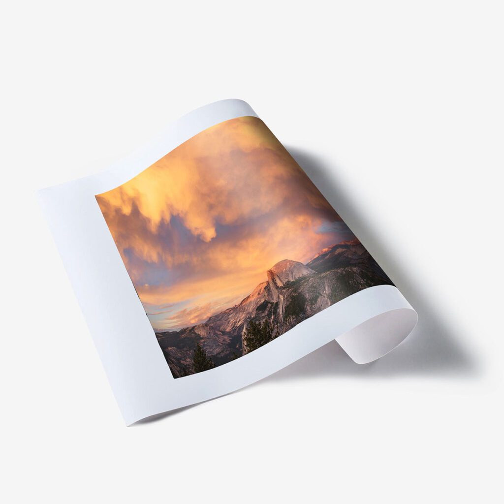 High-quality digital print of a mountain and cloudy sky.