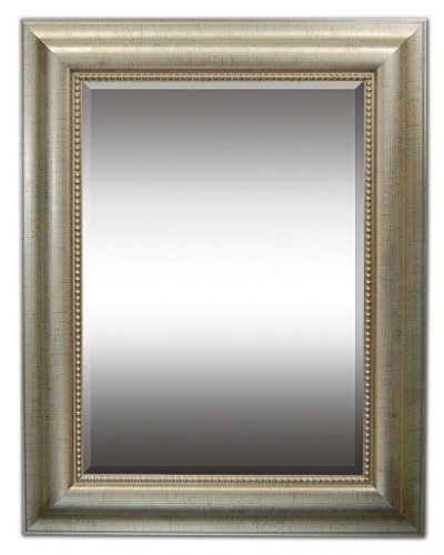 Custom mirror in a decorative frame with metallic finish and beaded inner edge.