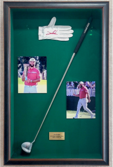 Sports mementos in a shadow box frame