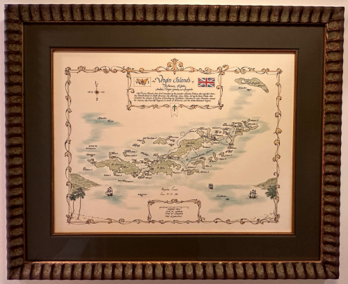 Dark, antique-style, fluted picture frame around an old map.