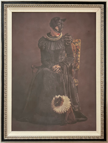 Oil painting of a lady in a masquerade outfit in a frame with double mat.