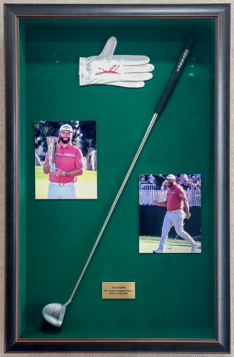 Golfing memorabilia in a custom shadow box frame.