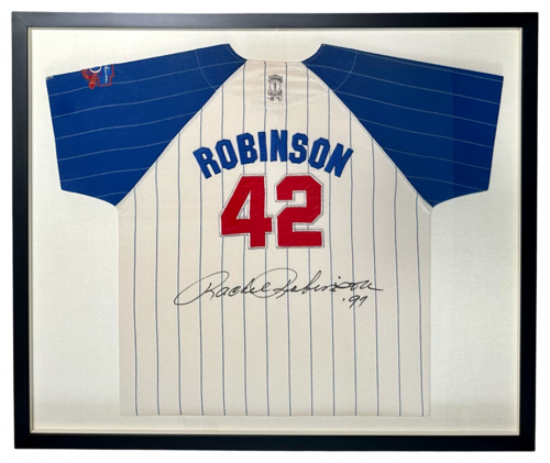 Jackie Robinson of the Dodgers baseball jersey in a frame.