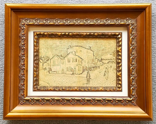 Ornate custom frame and mat around a sepia sketch.