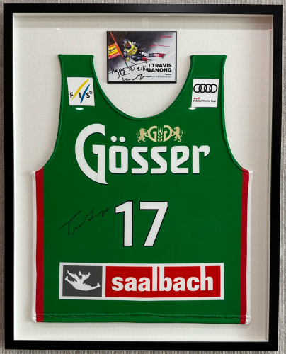 Framed green sports jersey in a custom shadow box.