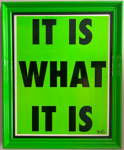 Text poster in a custom, green frame.