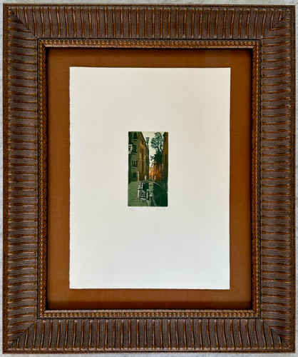 Dark, textured frame with a fluted design, beaded edge, and brown matting.